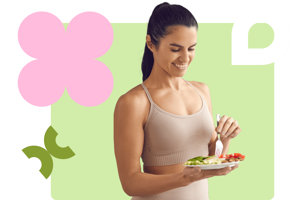 A woman in athletic wear is smiling while holding a plate of healthy food, including cucumbers and tomatoes, against a colorful geometric background.